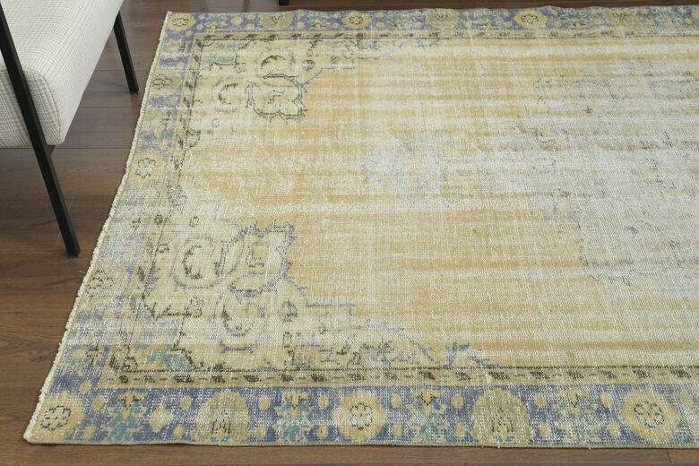 Antique Faded Yellow Anatolian Rug