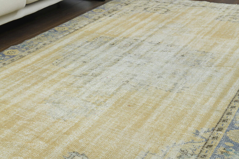 Antique Faded Yellow Anatolian Rug