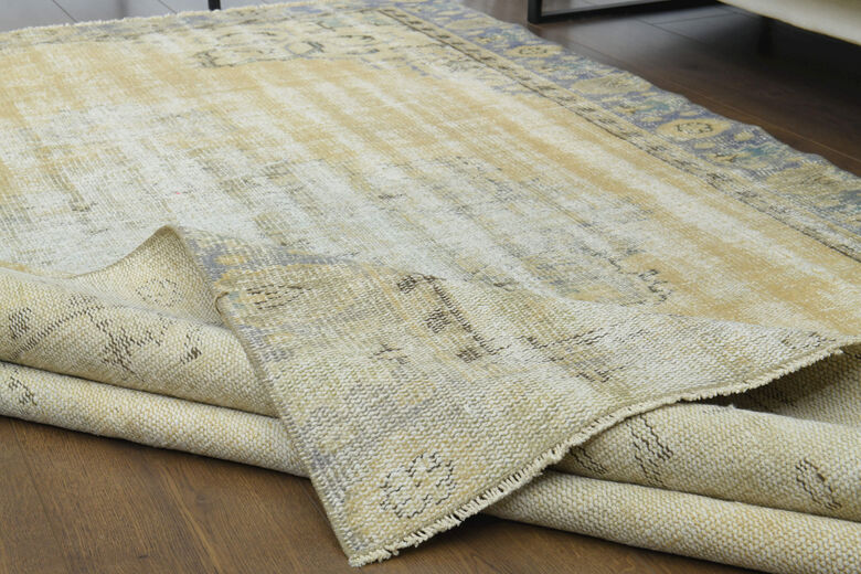 Antique Faded Yellow Anatolian Rug