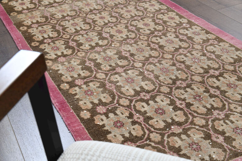 Pink Bordered Brown Carpet